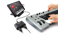 Load image into Gallery viewer, IK Multimedia iRig MIDI 2 Universal MIDI interface for iPhone/iPod touch/iPad and Mac/PC